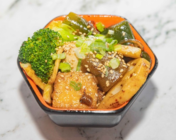 Mala xiang guo spicy dry mix delivery bowl with Szechuan peppercorns, sesame and tofu